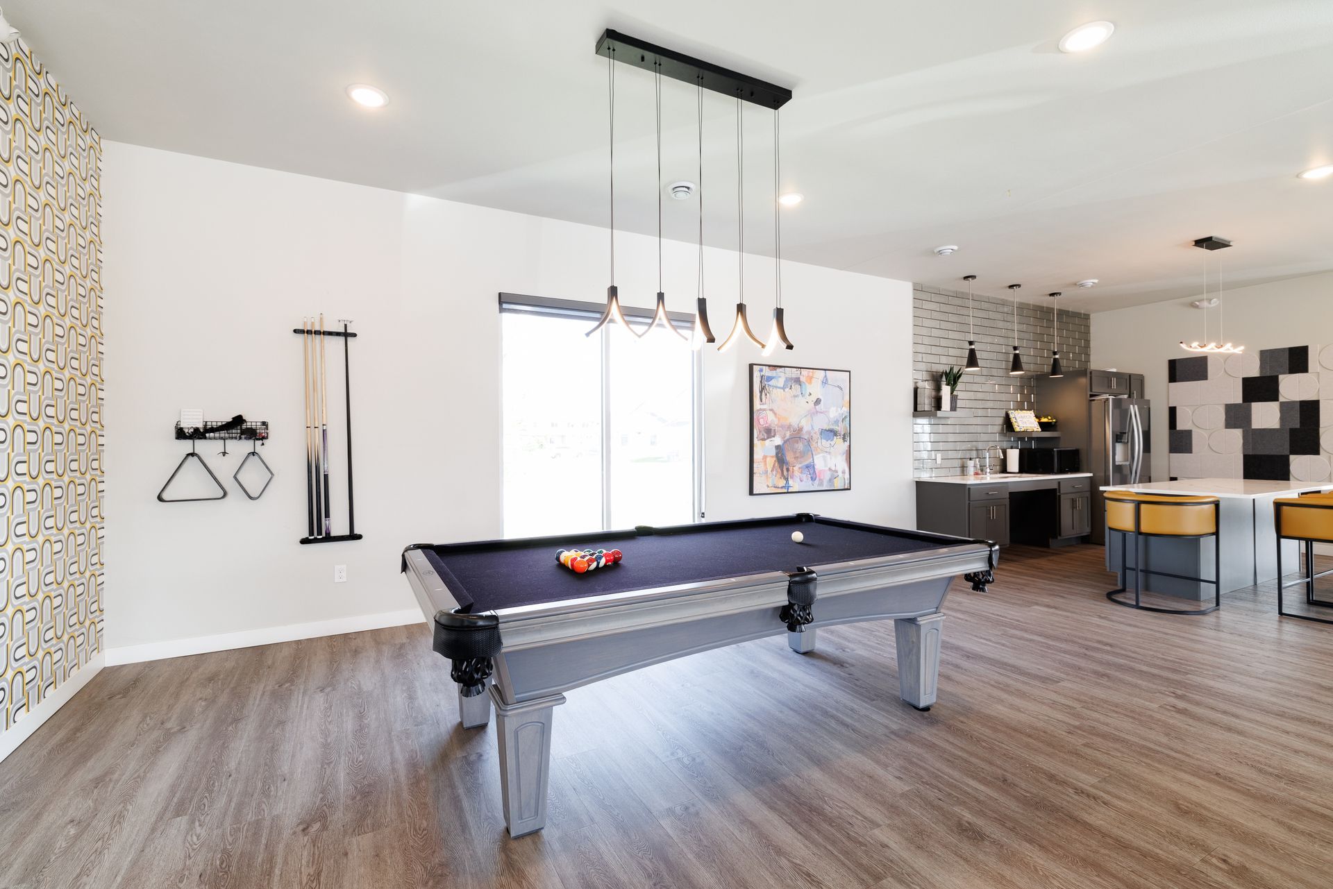 A pool table inside the clubhouse.