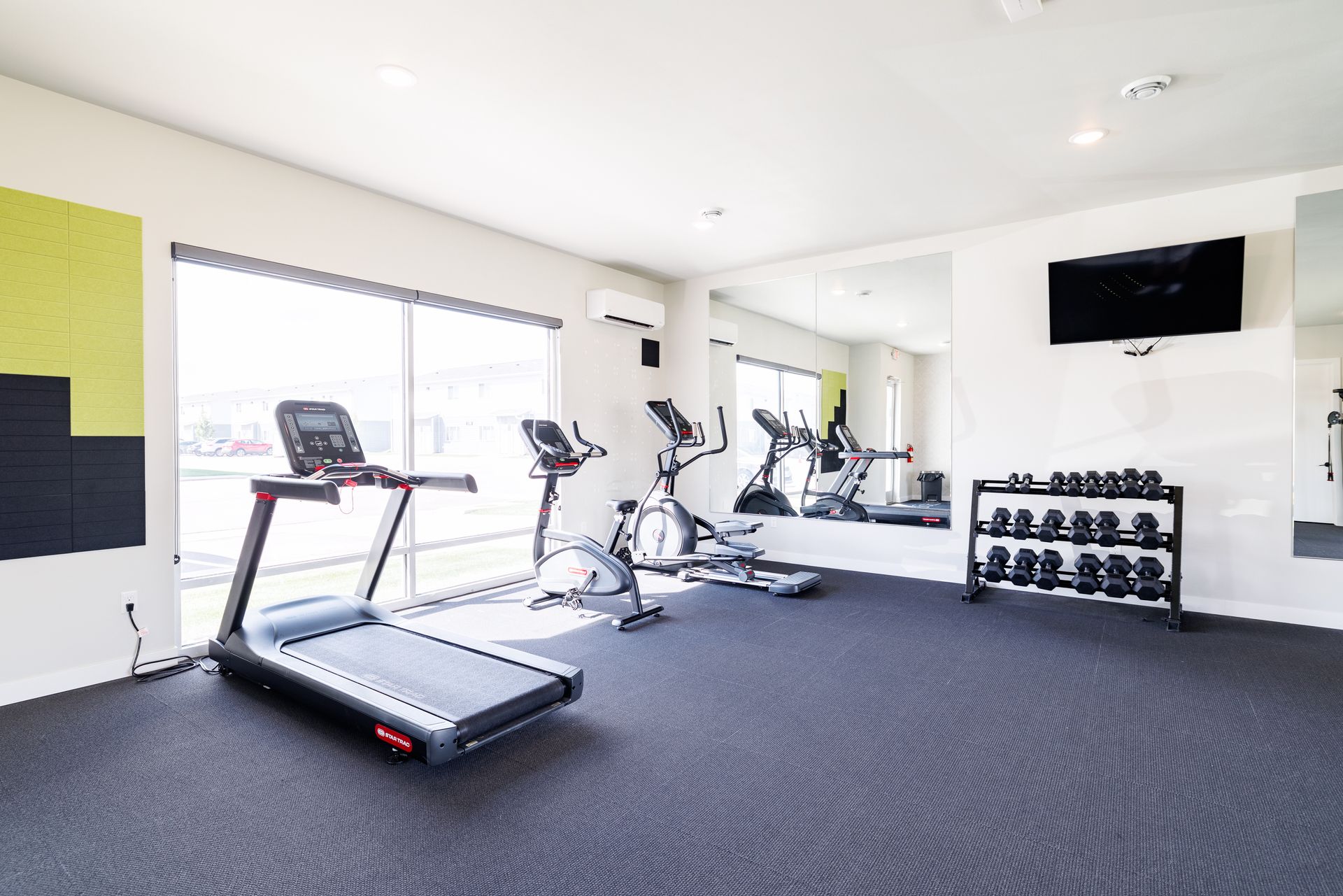 Gym with fitness equipment.