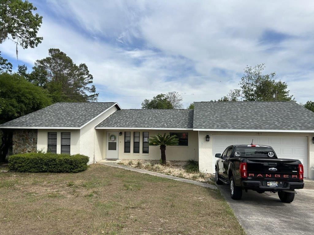 Beige House With Gray Roof | Homosassa, FL | Washburn Roofing LLC