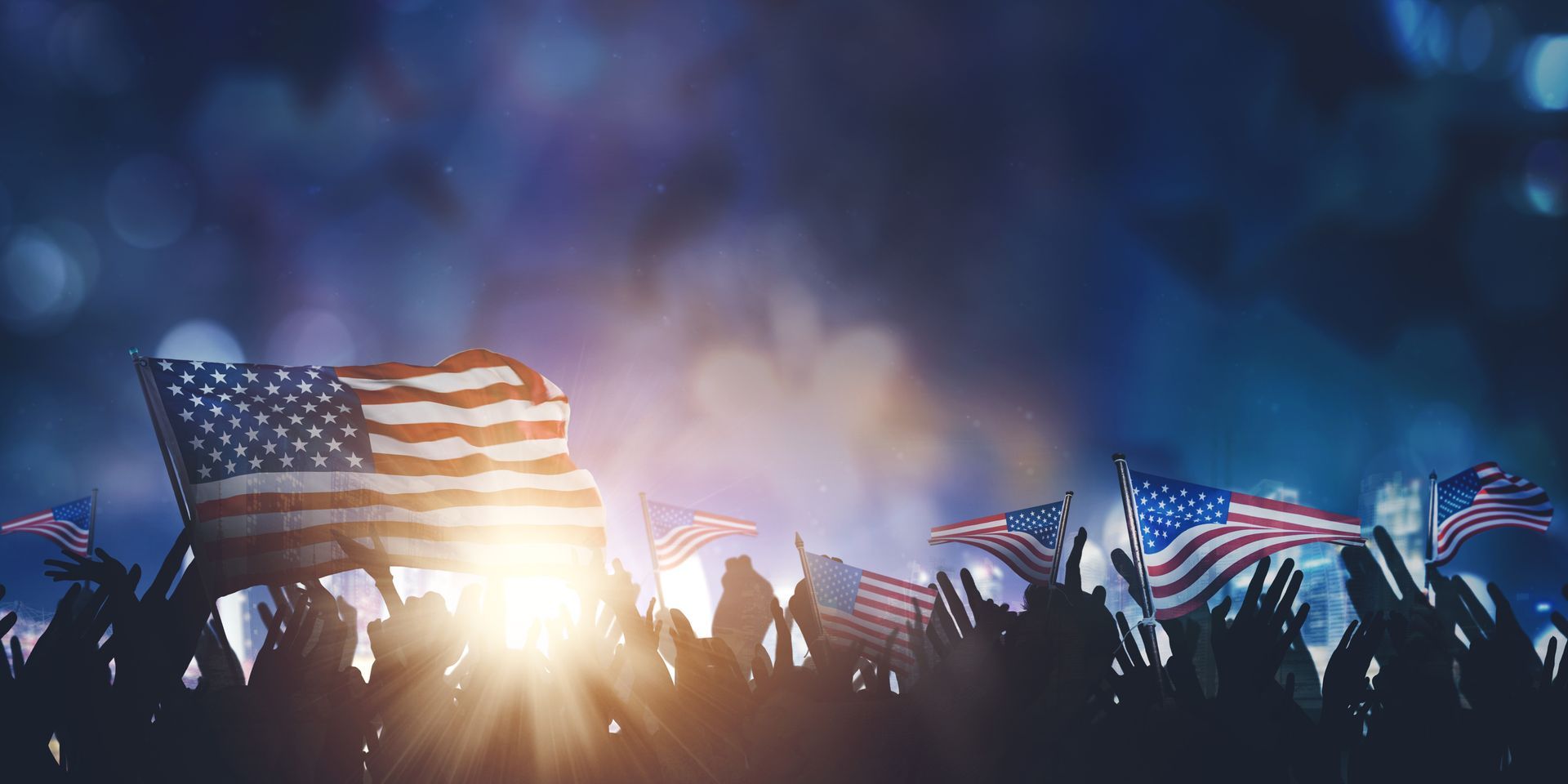 people holding up lags at an event