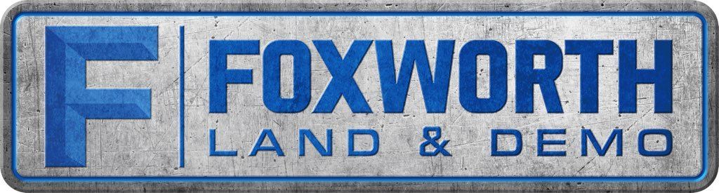 A logo for Fox Worth Land and Demo LLC.