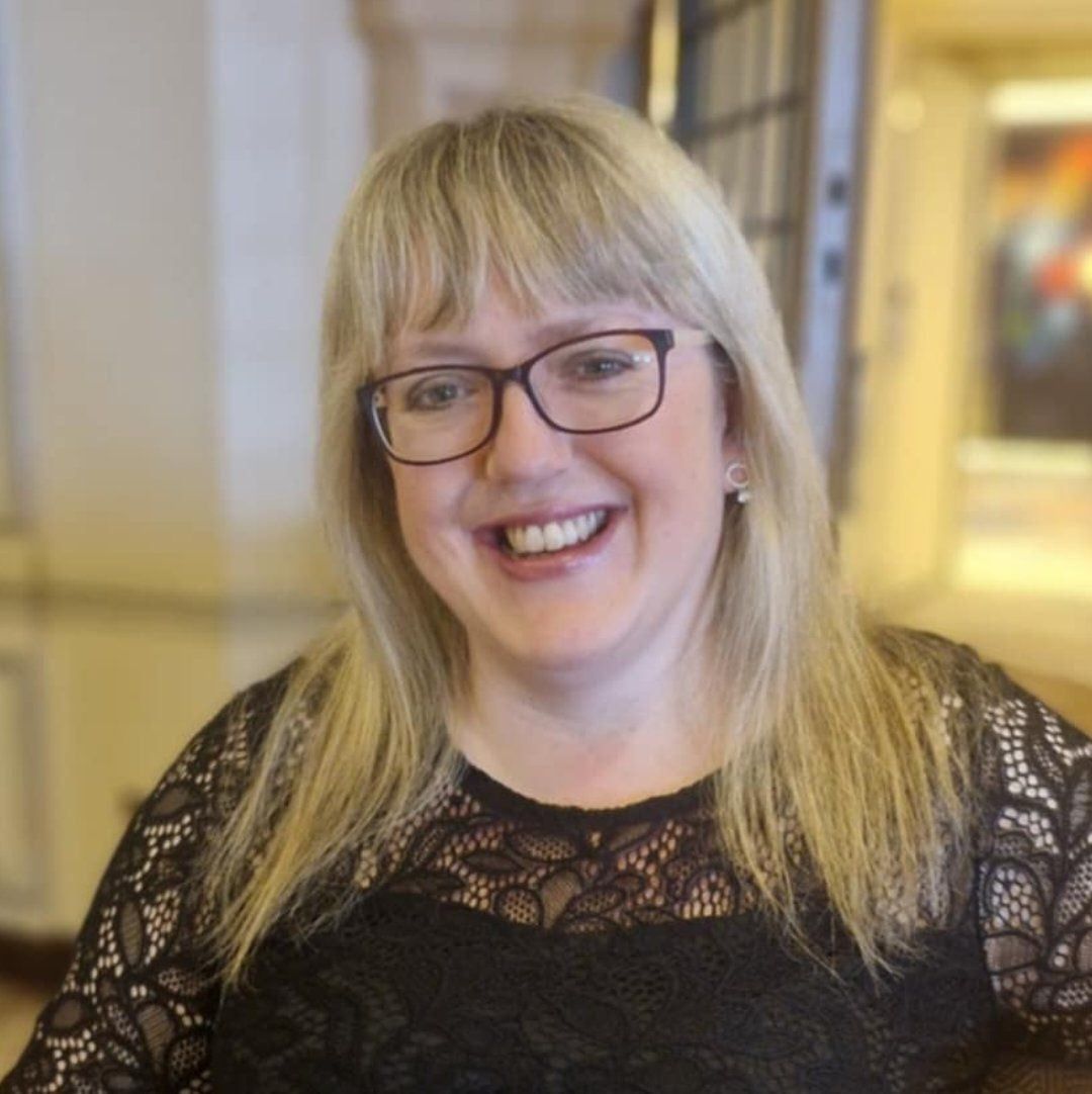 A woman in a green dress