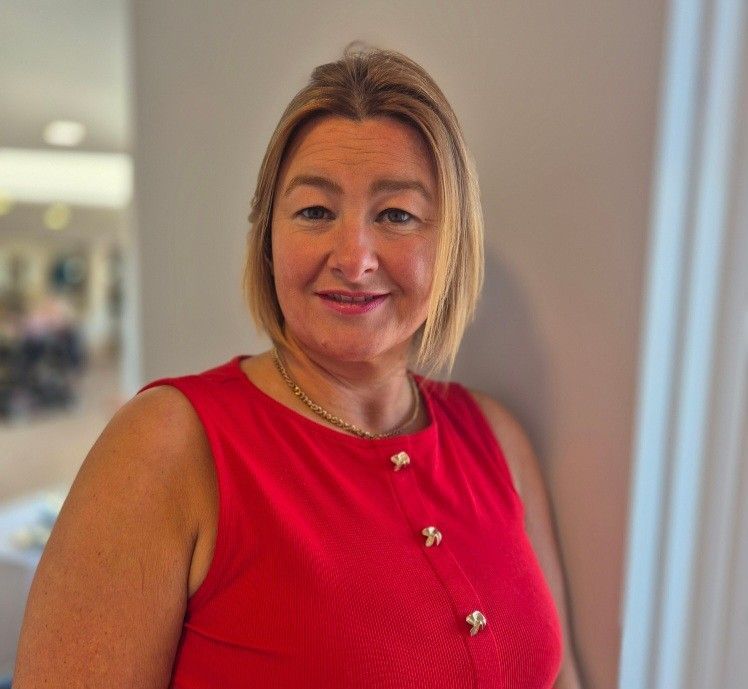 A woman in a green dress