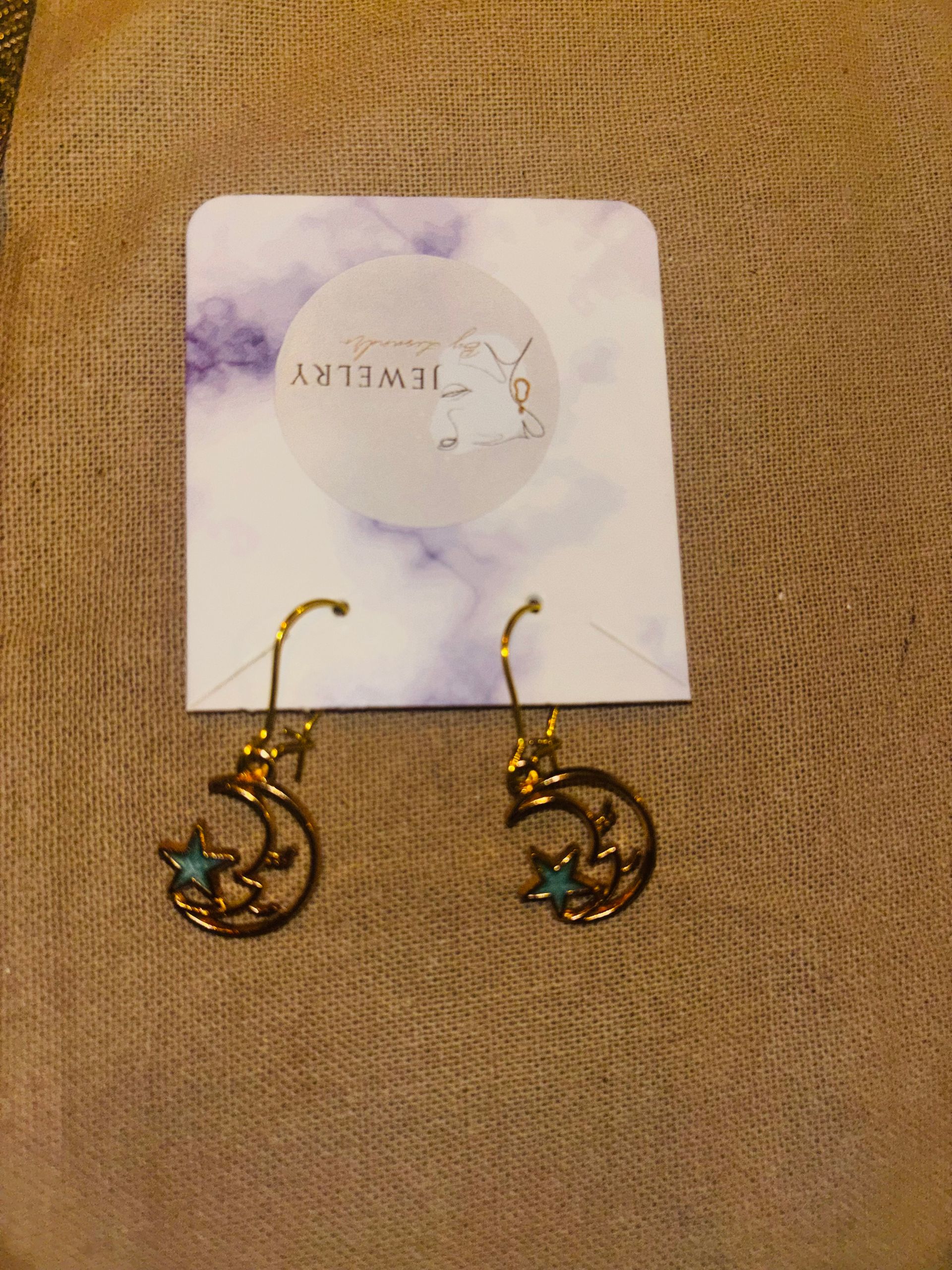 A25 een hanger maan met met blauwe ster