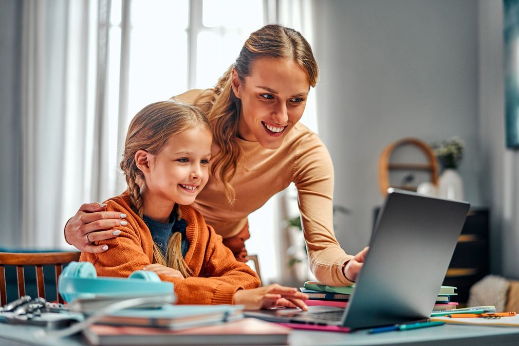 Image of occupational therapist helping child