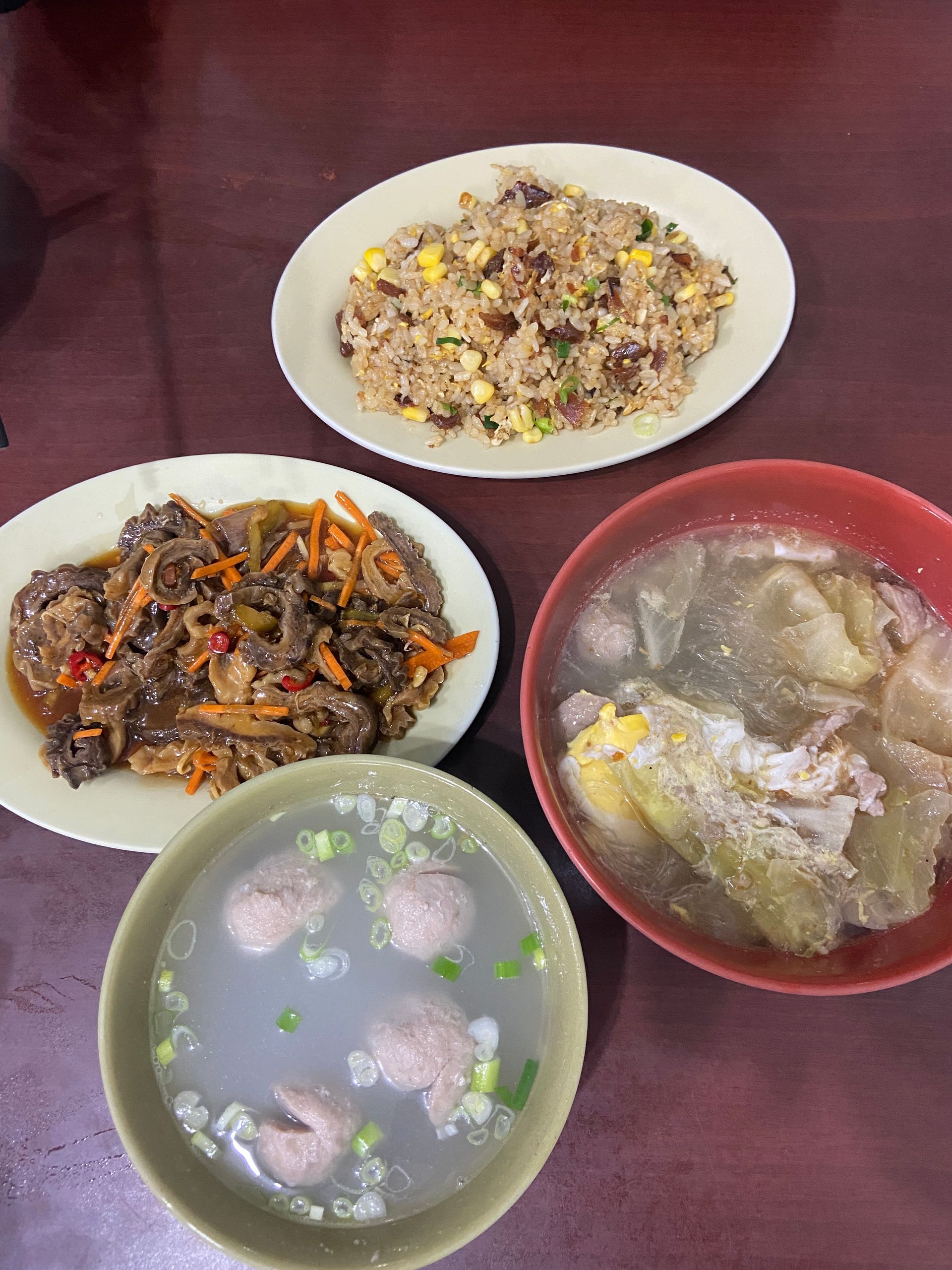 Typical meal at Cai Mama. Meatball soup, fish belly, mahi mahi fried rice and bean noodle soup