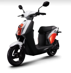 A black and white scooter with a red tail light