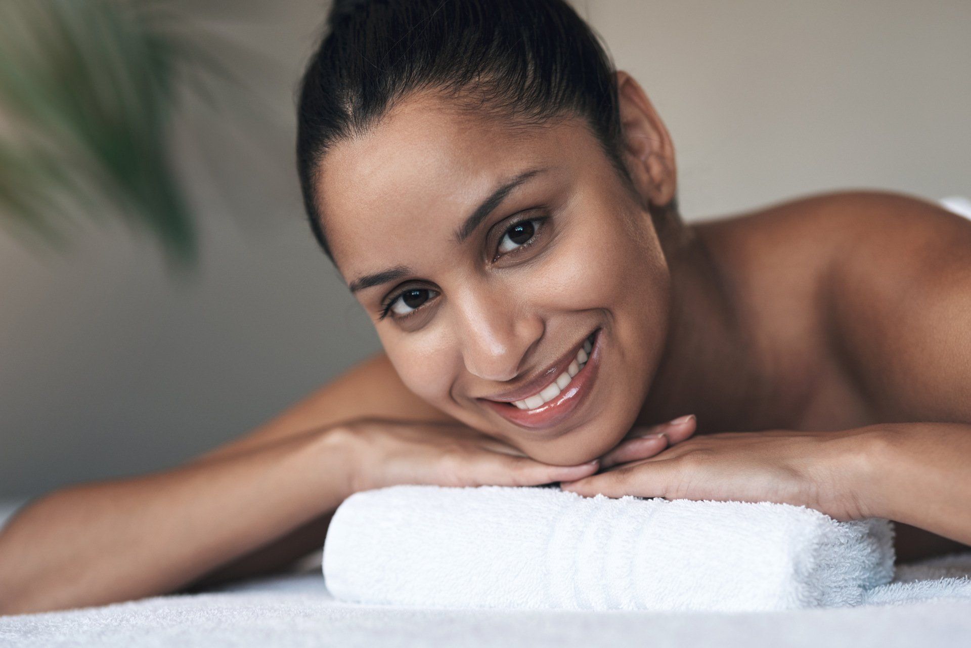 woman smiling in spa setting