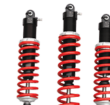 Three red coil-over shock absorbers for a vehicle, with black cylinders and upper mounts.