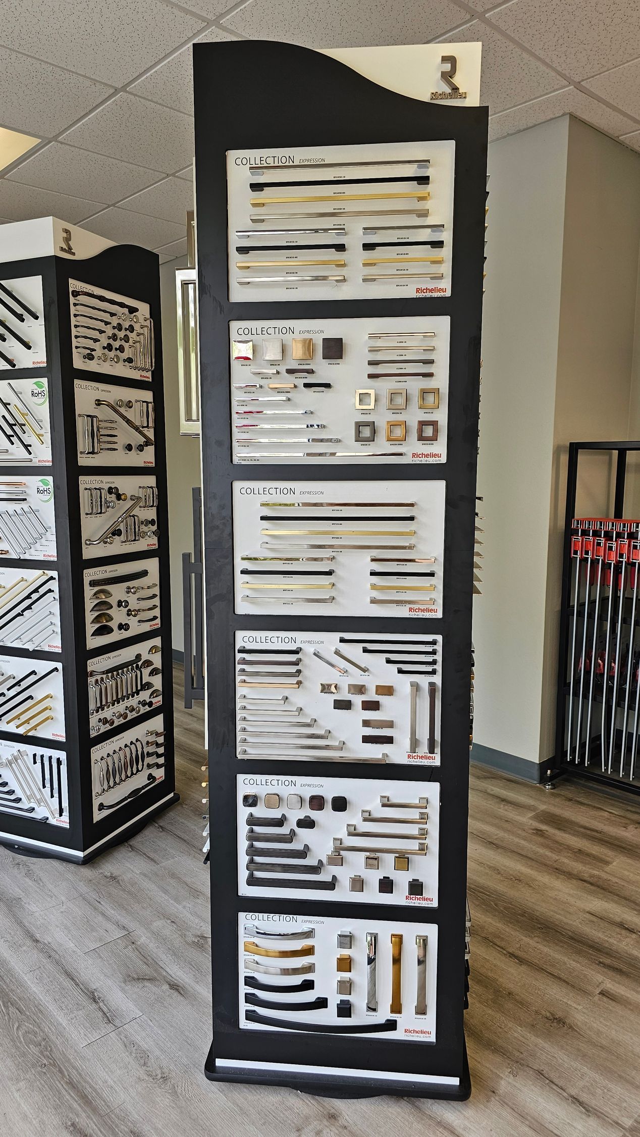 A display of cabinet handles and knobs in a store.