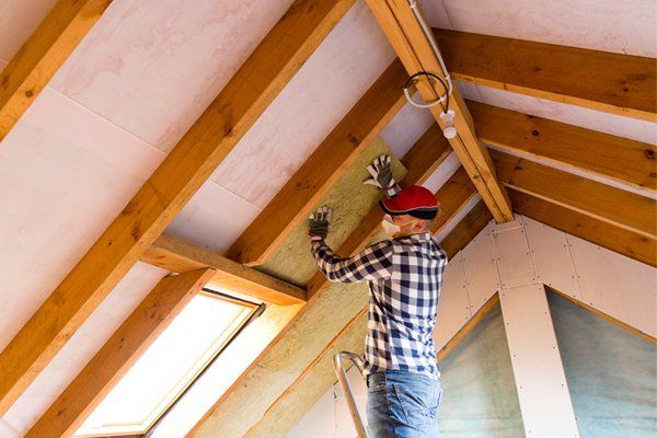 New — Man Installing Thermal Roof Insulation in Oak View, CA