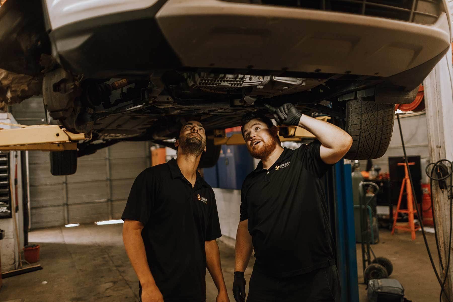 Pemberton Mechanics Working under a Car | Silvhorn Automotive