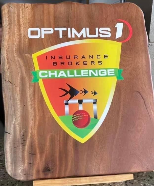 A wooden sign for optimus 1 insurance brokers challenge — Optimus 1 Insurance Brokers in Westcourt, QLD