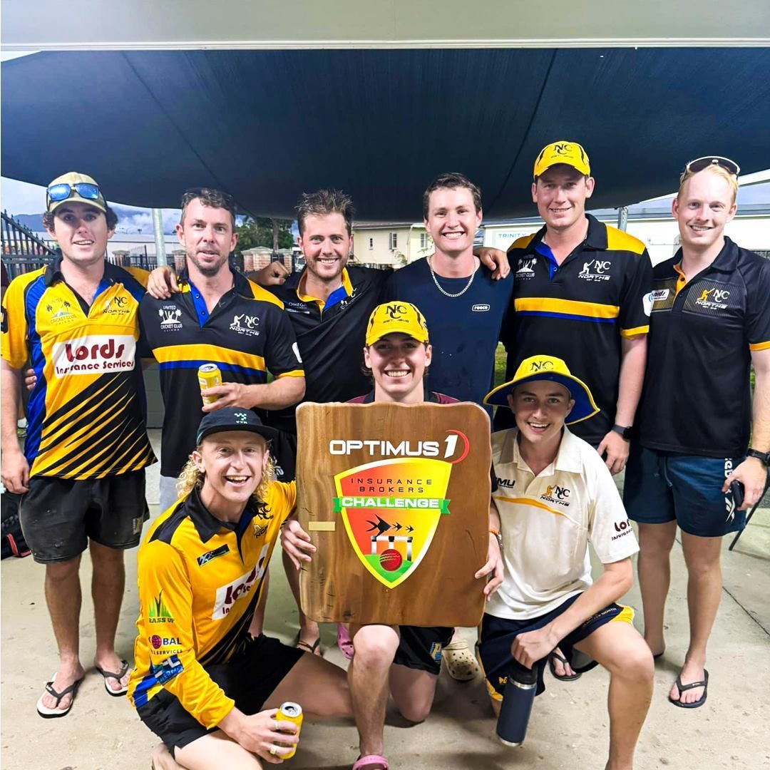 A Group of Men Are Posing for a Picture With a Sign That Says Optimus — Optimus 1 Insurance Brokers in Westcourt, QLD