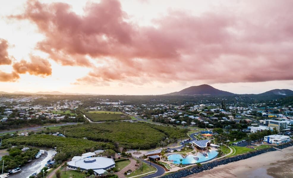 Coastal Town Under A Dramatic Sunset — Capricorn Communications in Capricorn Coast, QLD