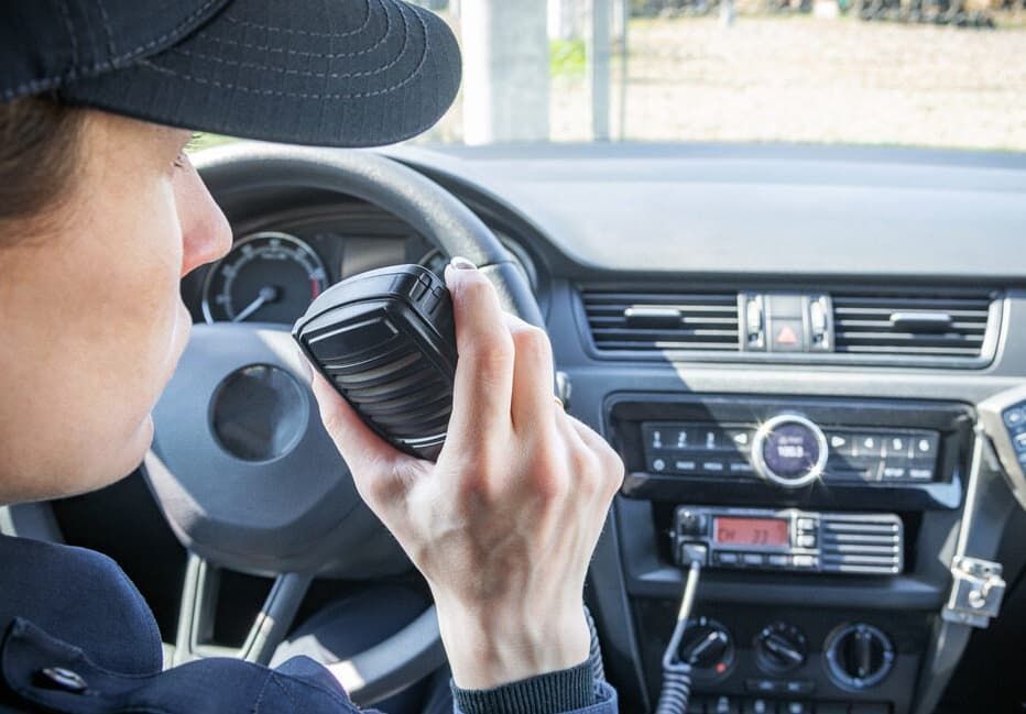 A Person Using A Radio — Capricorn Communications in Kawana, QLD