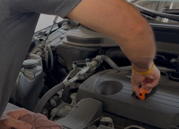 ProAuto technician performing vehicle maintenance to ensure safety and reliability in Morton Grove, 