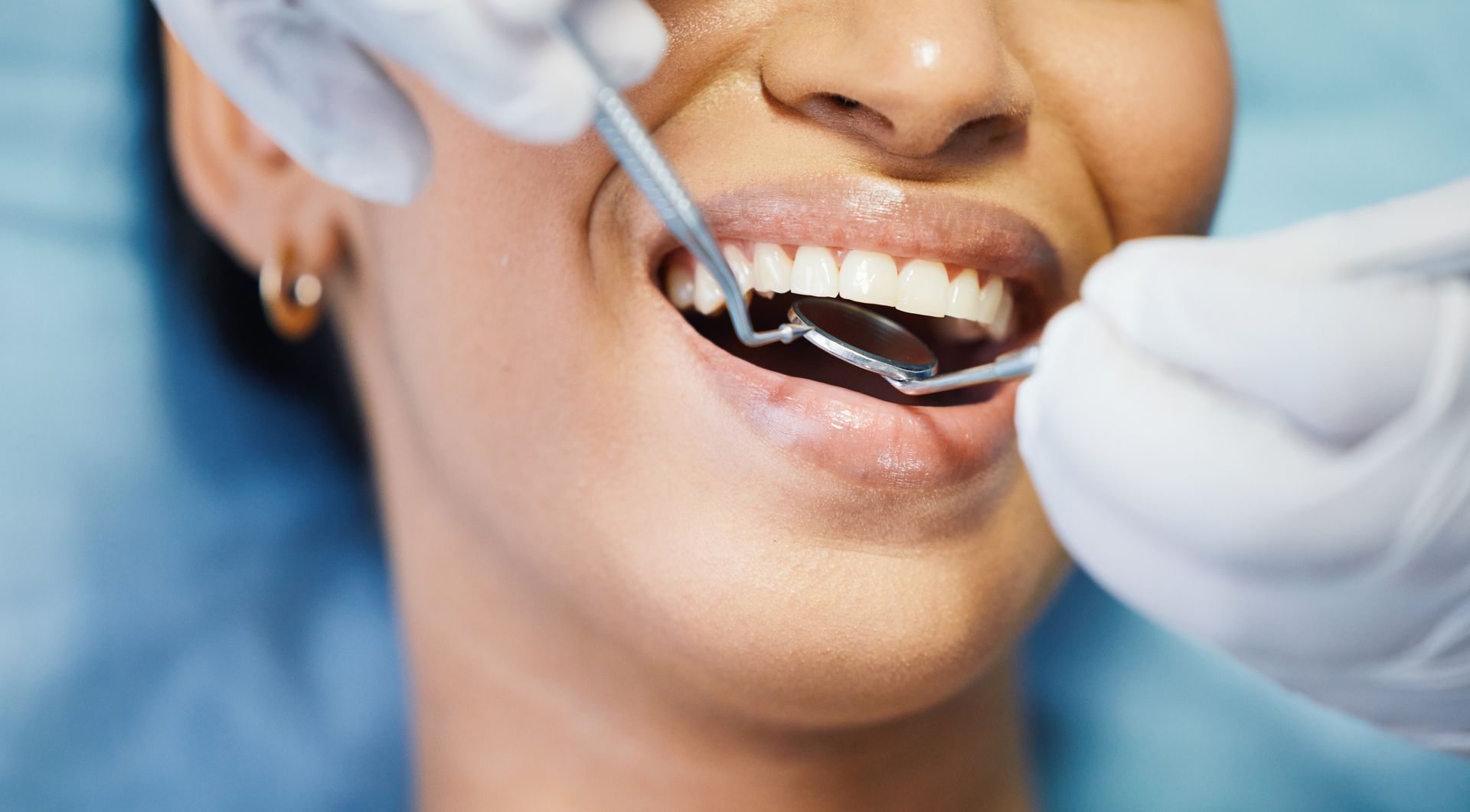 Close-up of young woman at dental examination.