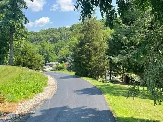 CM Ayres-installed asphalt driveway offering a smooth and long-lasting surface.