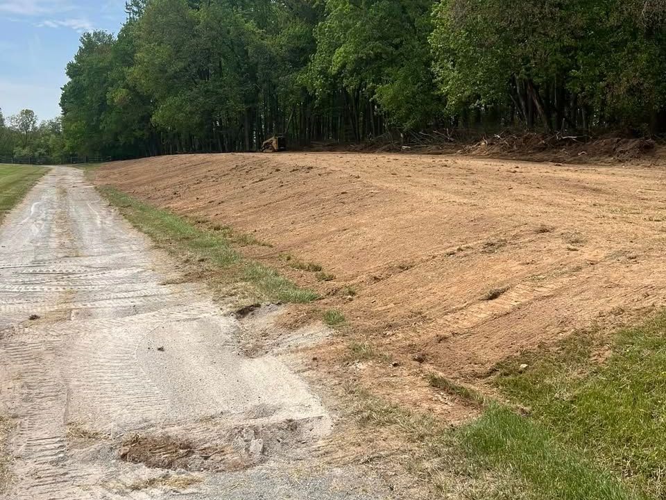 Completed grading and drainage project by CM Ayres ensuring proper water runoff