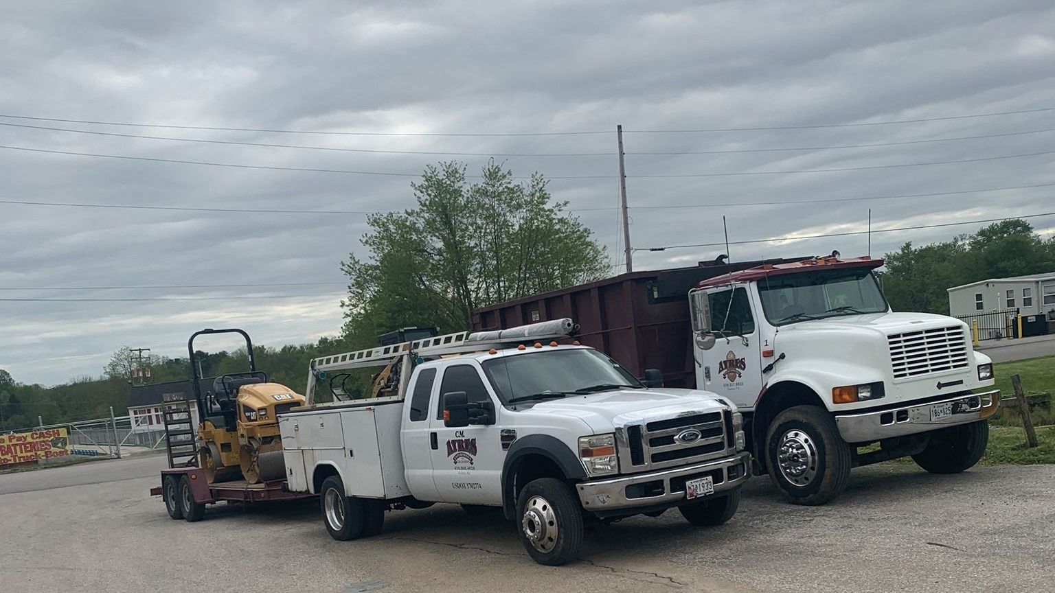 CM Ayres crew and trucks ready to begin asphalt paving work in Baltimore
