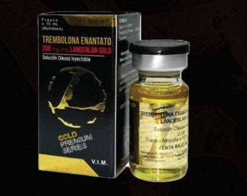 Una caja negra y dorada y un vial de vidrio de aceite inyectable de enantato de trembolona Landerlan Gold