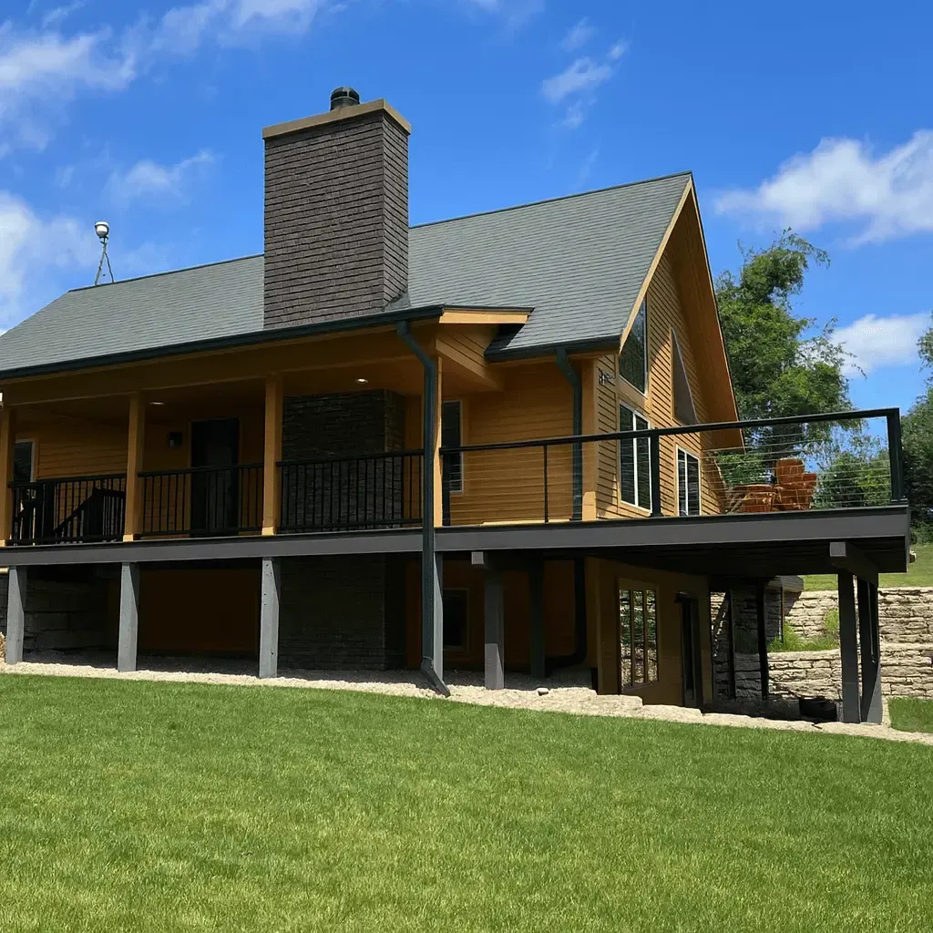 a deck with a circular pool inside it