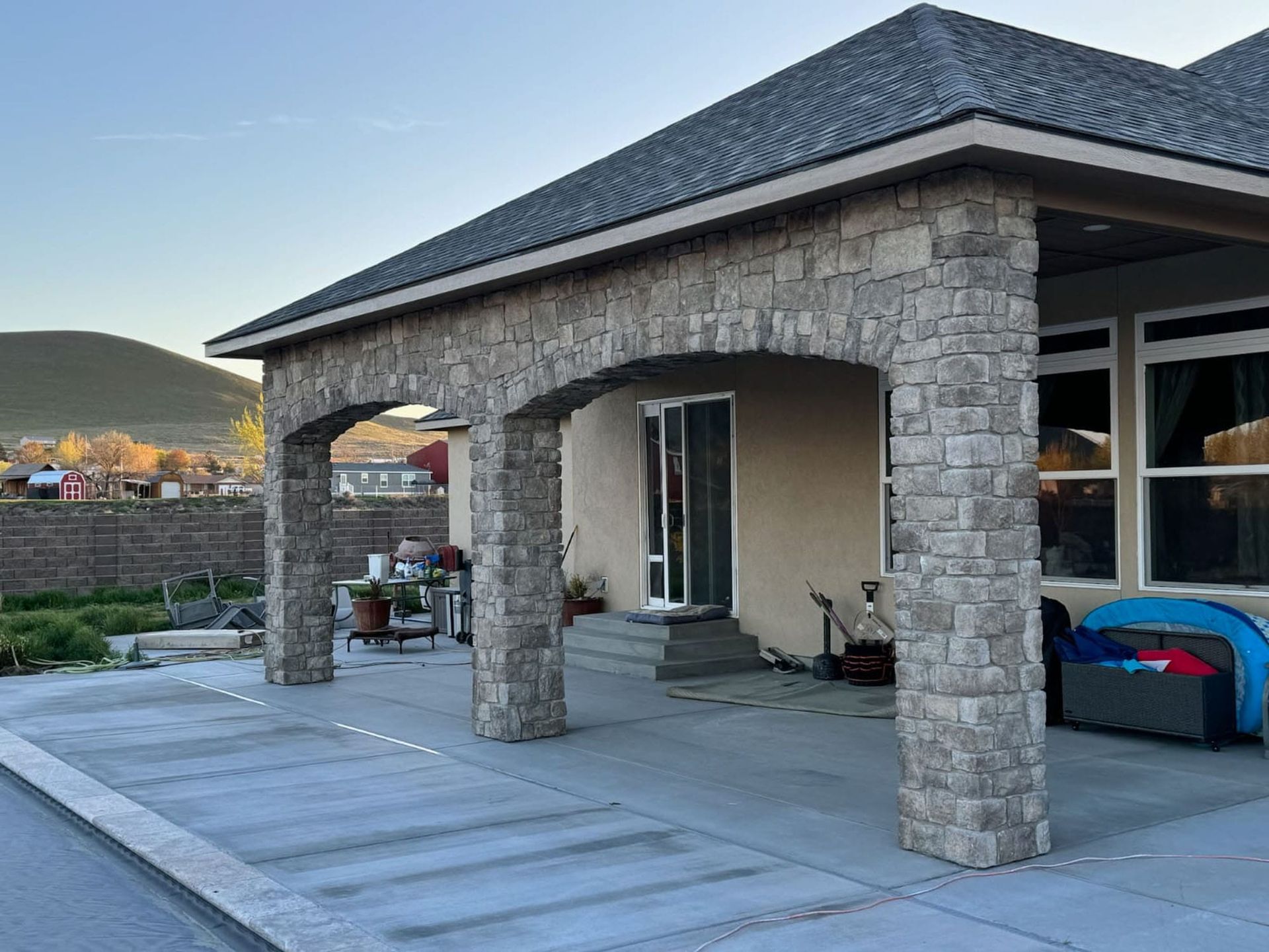 patio cover with brick pillars