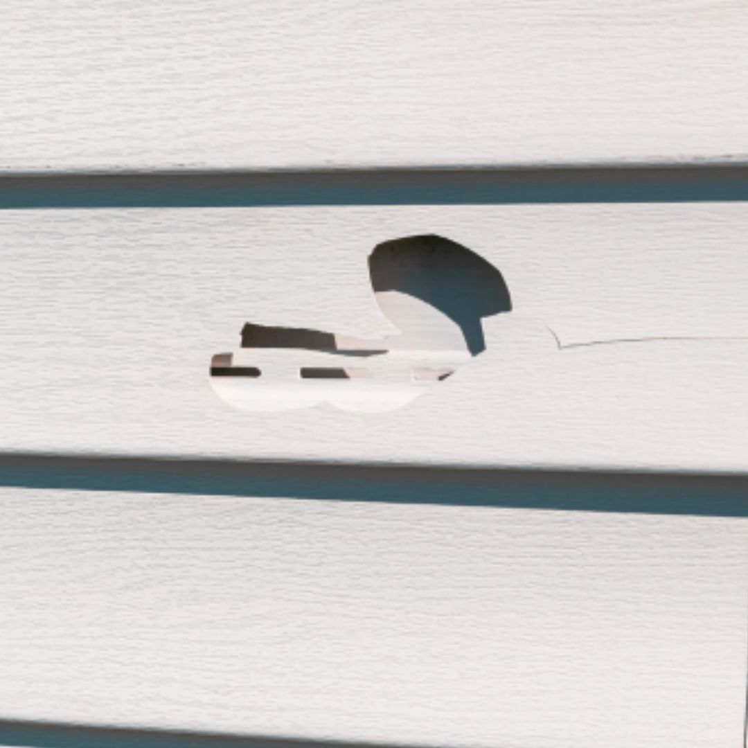 A close up of a piece of wood with a hole in it.