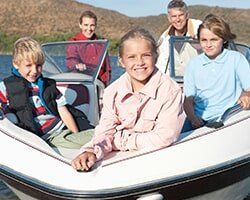 Family in Speedboat - Insurance Agency in Artesia, NM