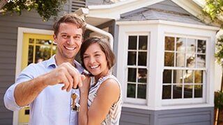 Couple with Keys - Homeowners Insurance in Artesia, NM