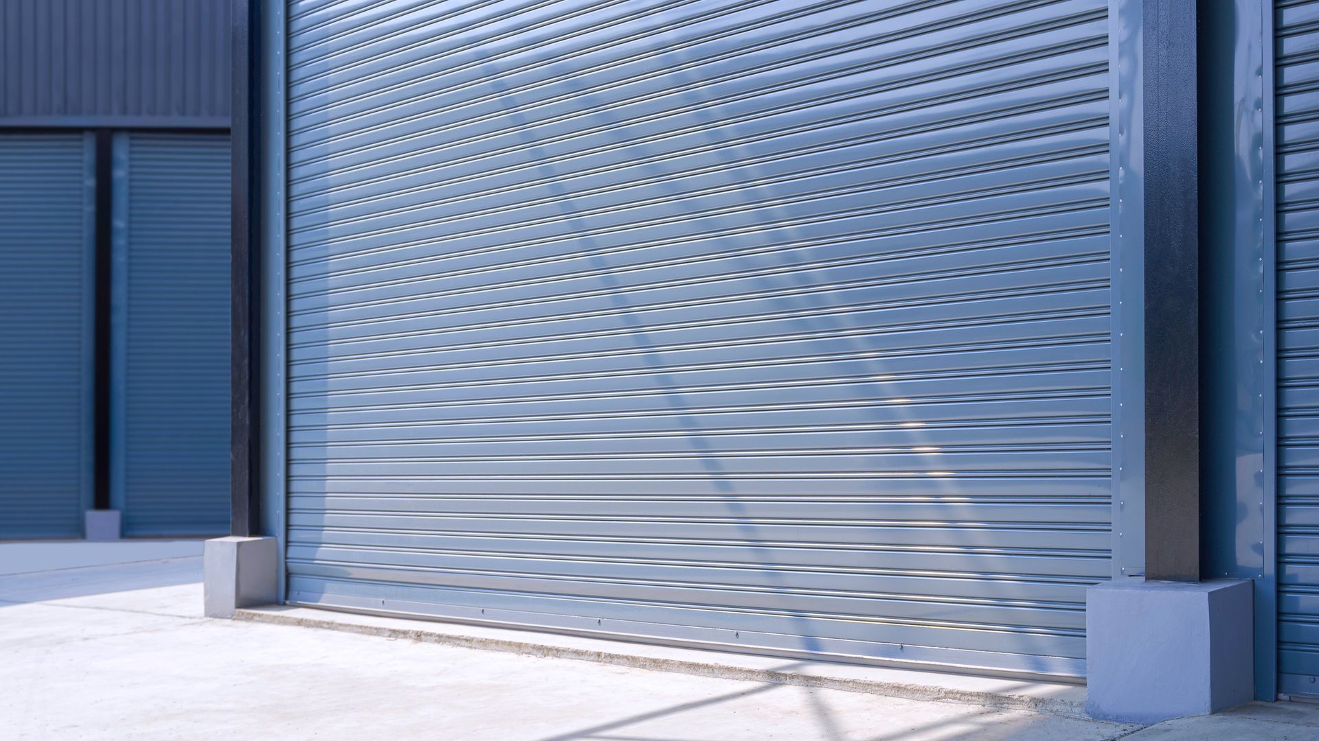 A close up of a roller shutter on a building.