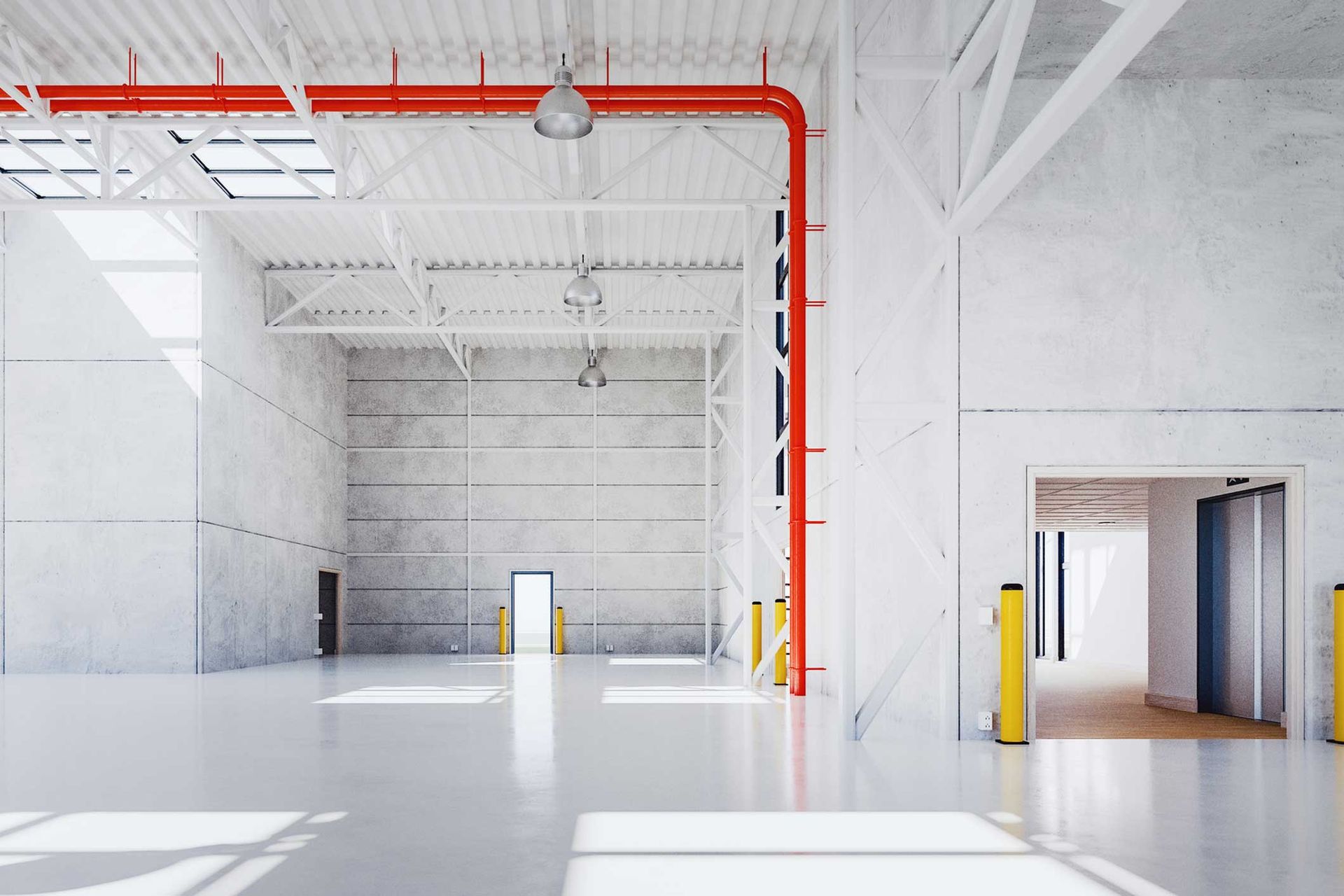 An empty warehouse with a red pipe hanging from the ceiling.