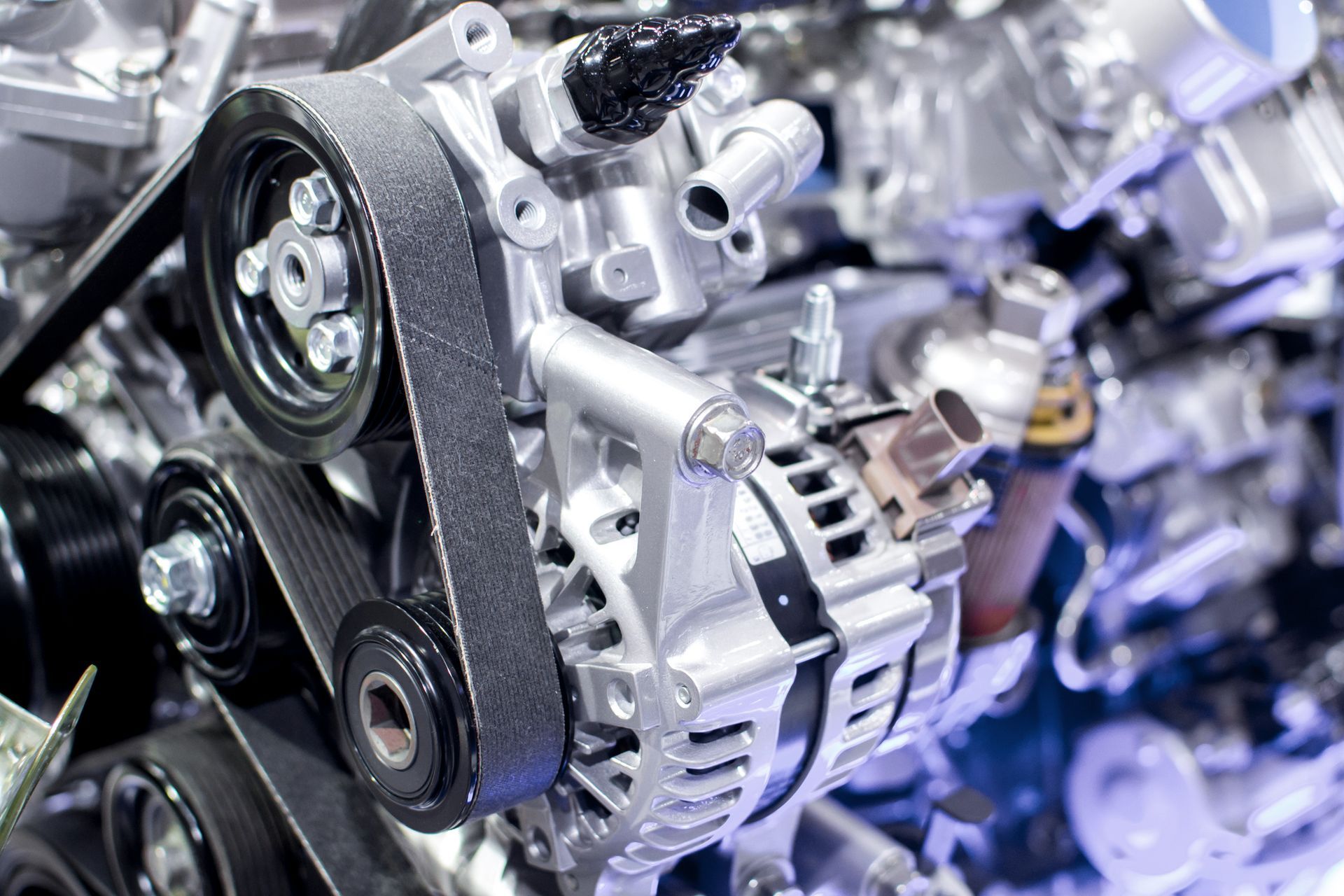 A Close-up Of a Car Engine with A Belt Attached to It — Saratoga Springs, UT — Younker Bros