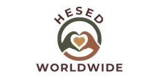 A logo for hesed worldwide with two hands making a heart