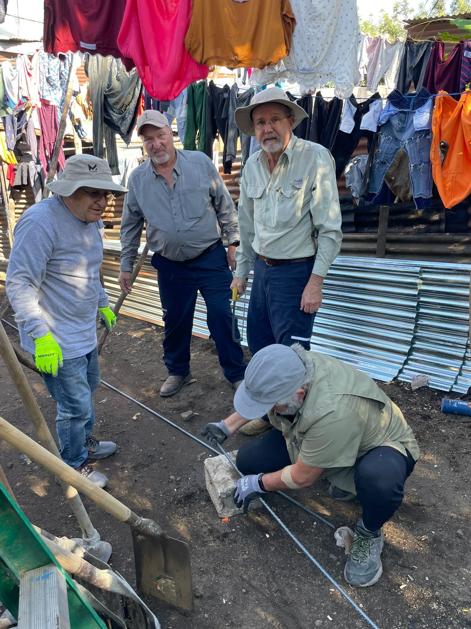 A group of men are working on a construction site.