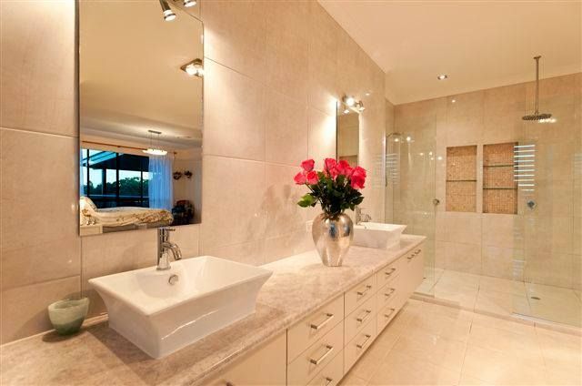 Bathroom With Two Sinks and a Large Mirror — Advance Kitchens in Landsborough, QLD
