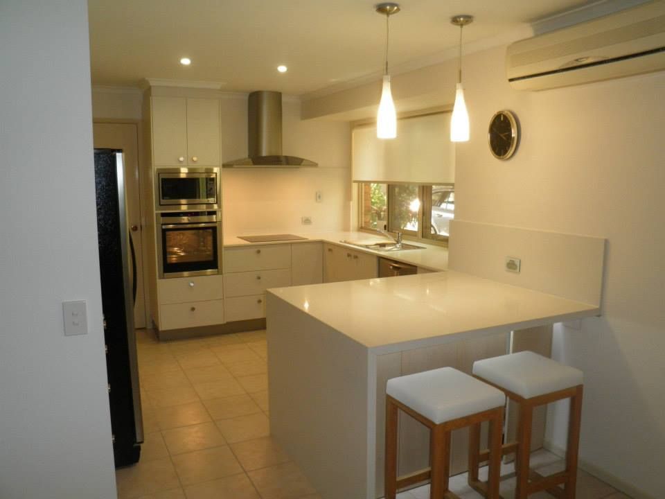 Kitchen With White Cabinets and White Counter Tops — Advance Kitchens in Beerwah, QLD