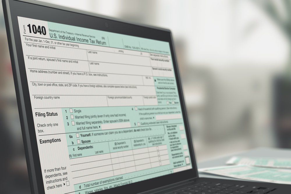Closeup of A Computer Laptop with A Tax Form on Screen — Newport, TN — K & S Bookkeeping & Tax Services