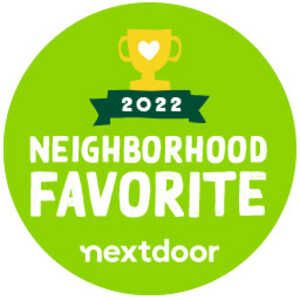 A green circle with the words neighborhood favorite nextdoor on it