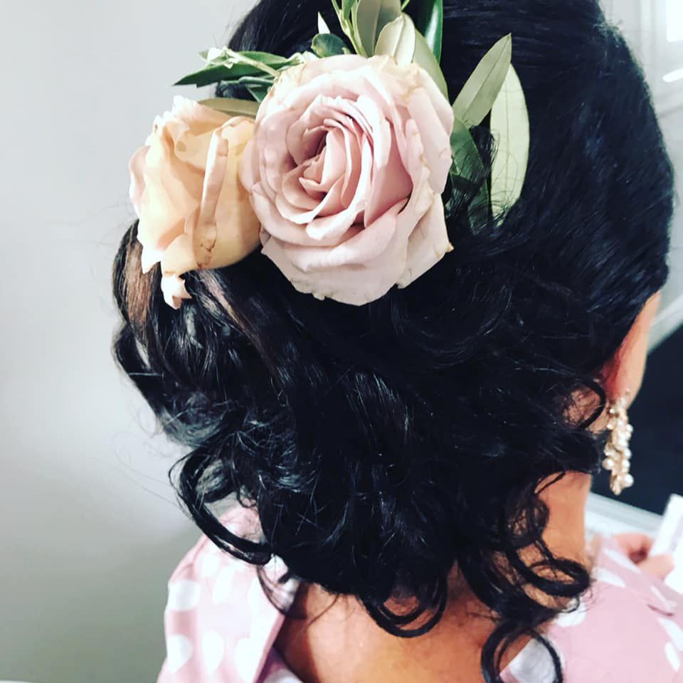 A Woman With A Pink Rose In Her Hair — Janine Wellings Hair Art In Belmont, NSW