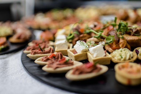 A close up of a tray of food on a table.