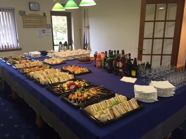 A long table with a lot of food on it