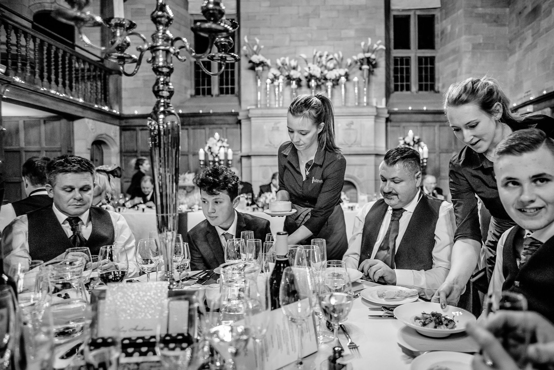 Work at out CPU Inverness, Highlands A black and white photo of a group of people sitting at a table.