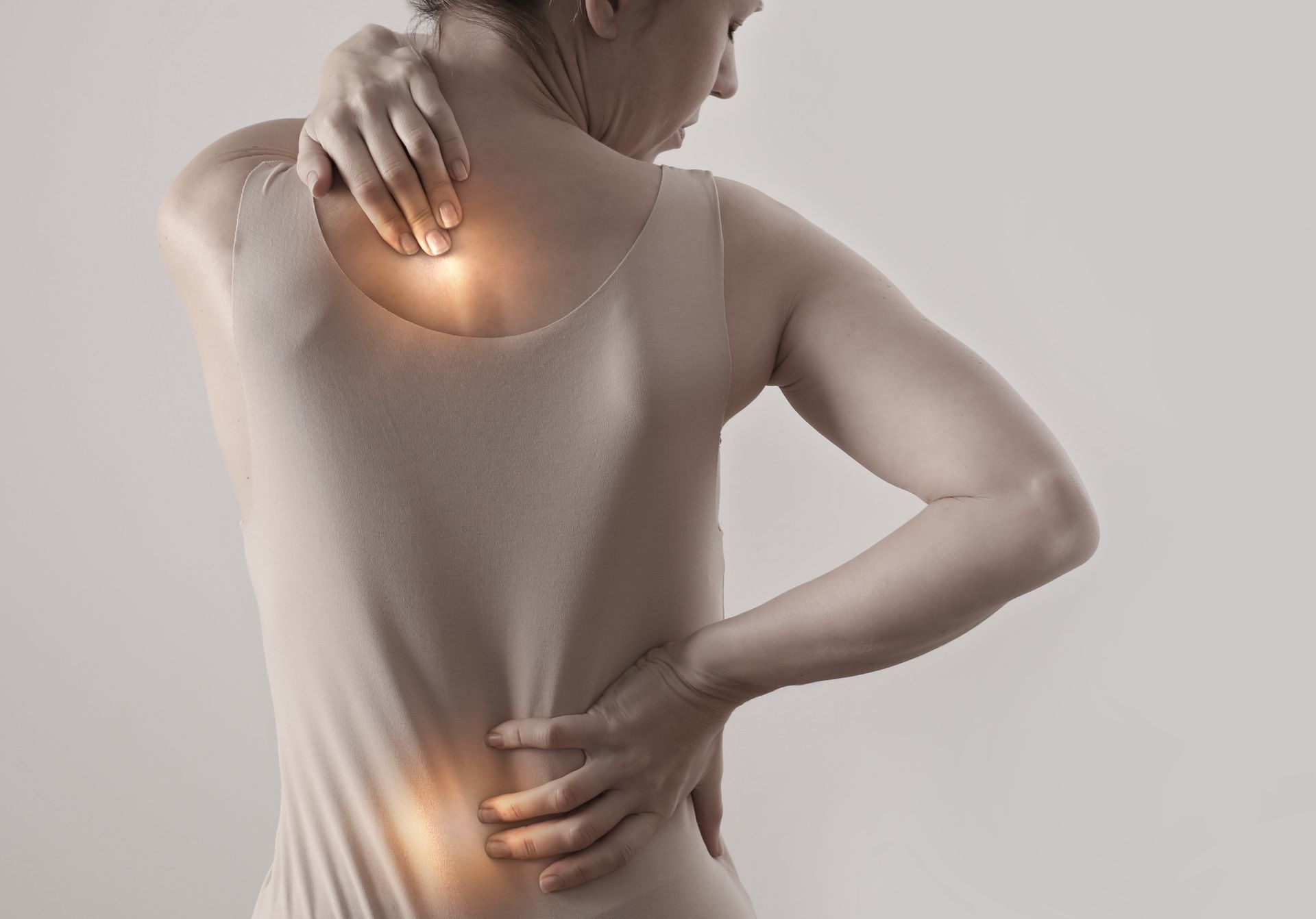 Image of woman suffering from neck and back pain