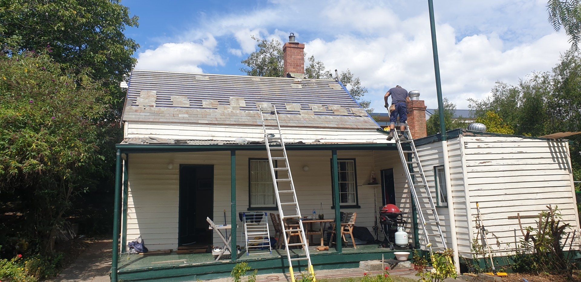 Slate roof on cottage restoration with reclaimed slates