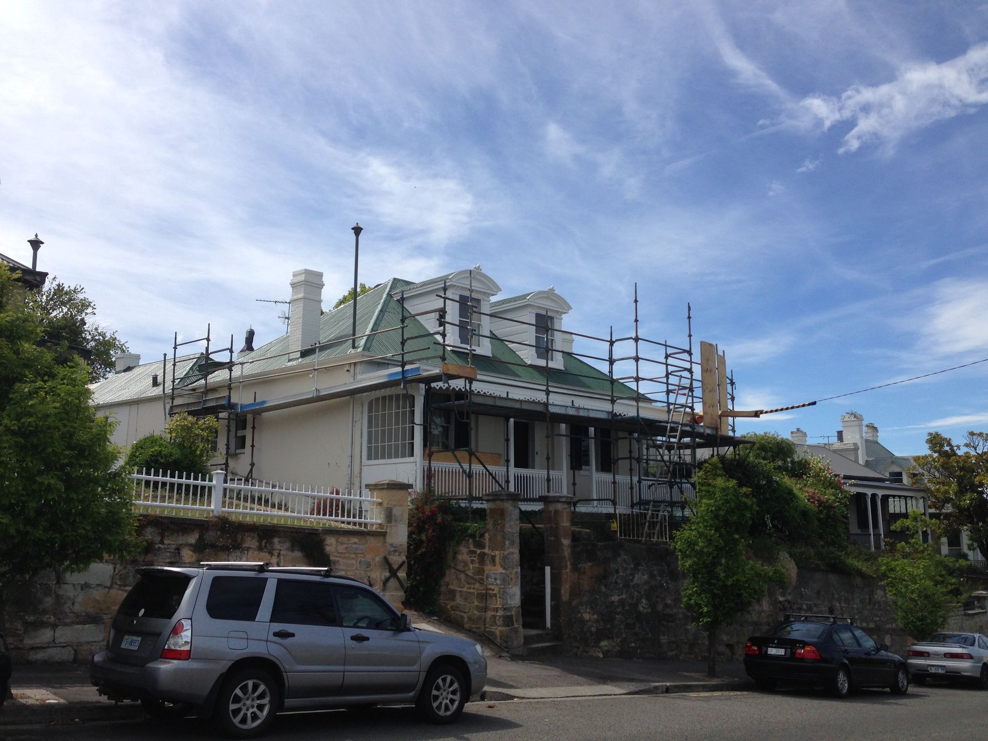 Roof restoration repairs painting dormer  widows chimney removal and chimney restoration heritage slate roofing hobart australia