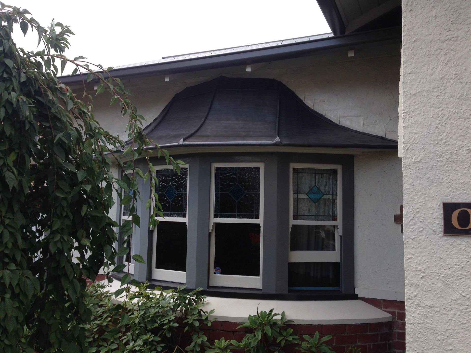 Roof restoration repairs lead sheet roof Roof restoration repairs small cottage painting heritage and slate roofing hobart australia