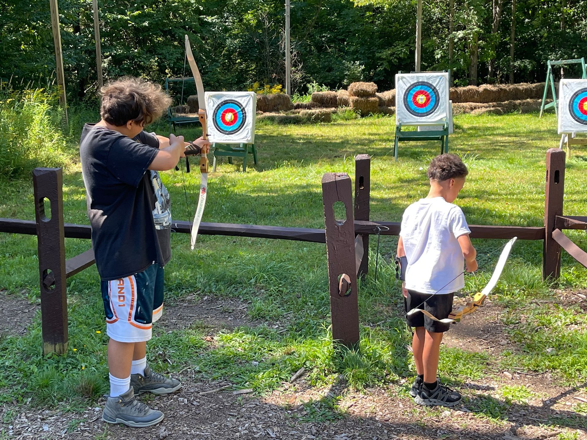 campers at the archery range
