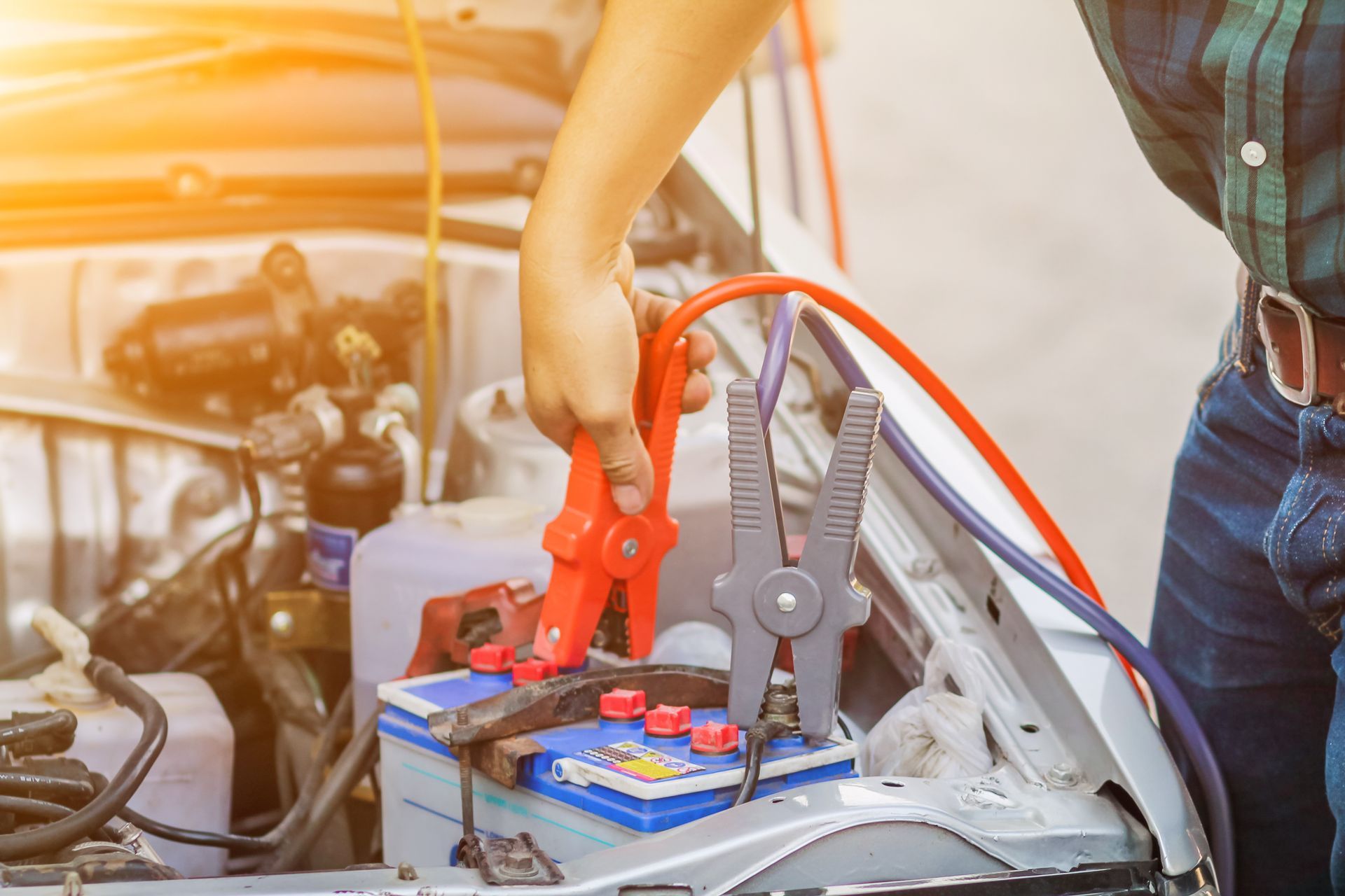 boat electrician testing a battery